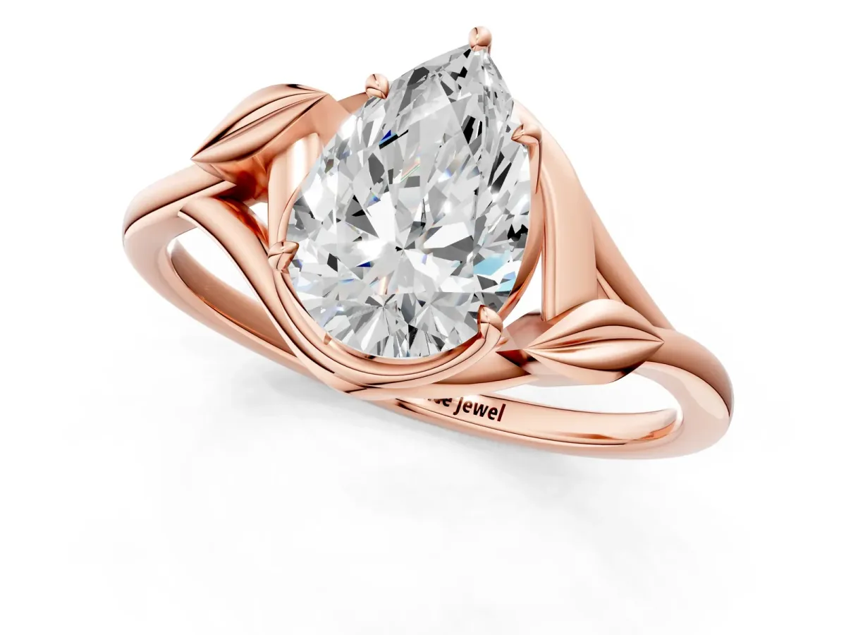 Pear Cut Diamond Solitaire Ring with Twist Band and Four-Prong Setting Rose gold