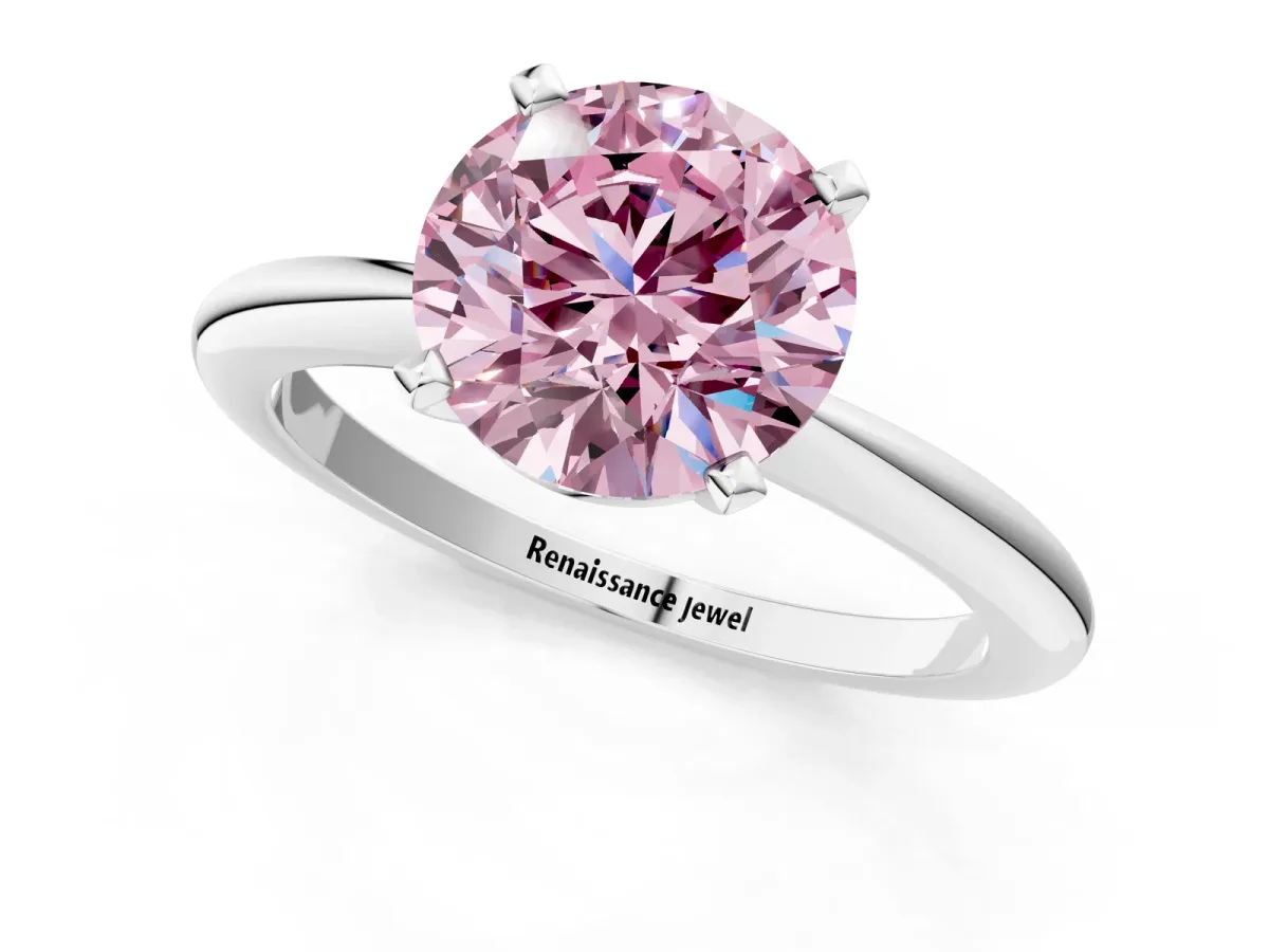 Fancy Pink Round Cut Diamond Solitaire Ring with Six-Prong Setting and Classic Band Silver