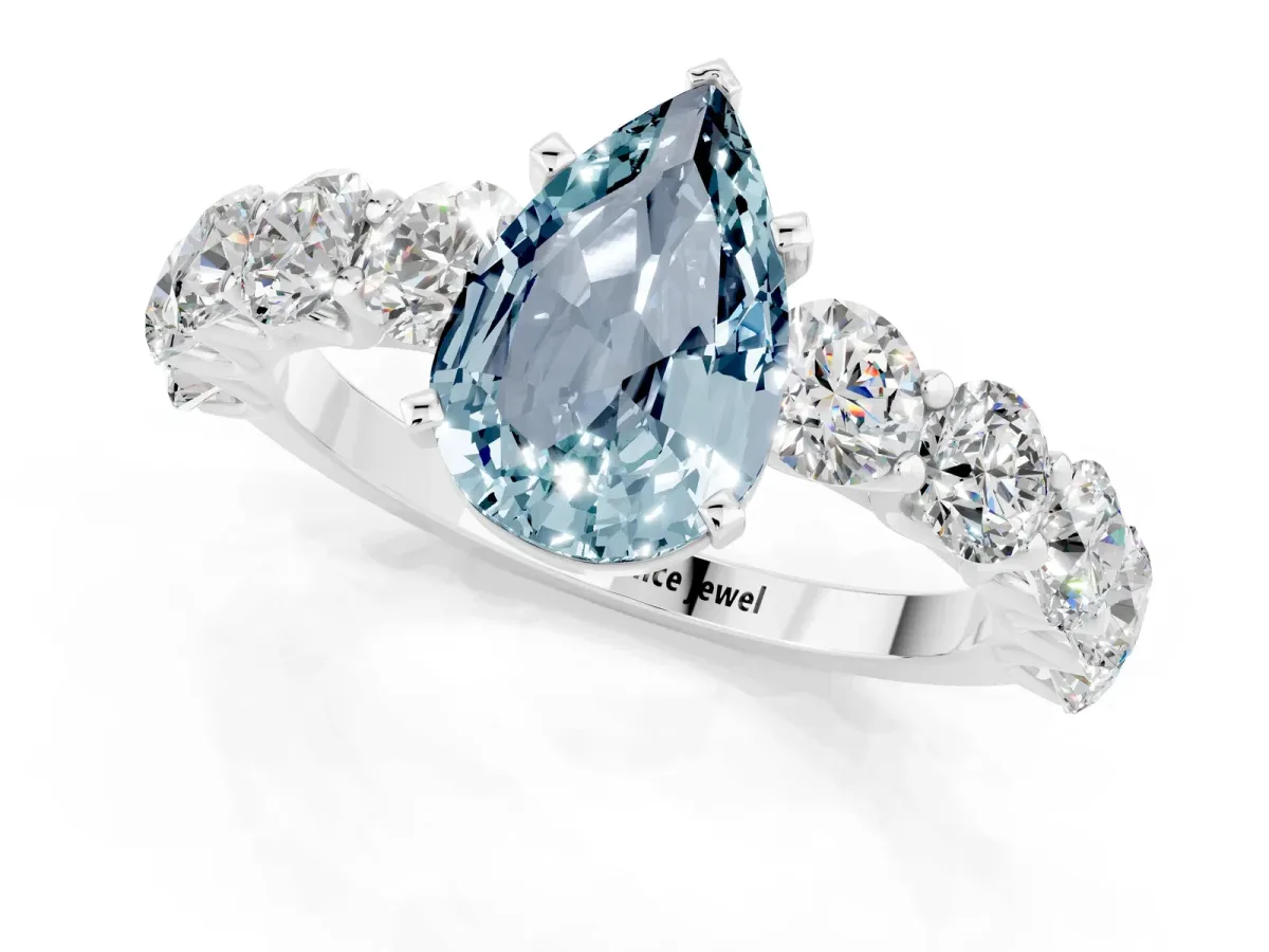 Pear Cut Aquamarine Prong Setting with Side Stones on a Pave Band Silver