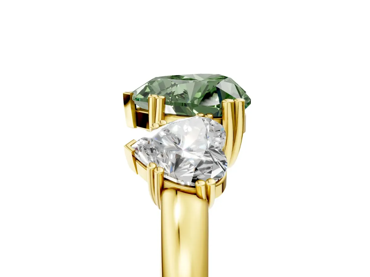 Fancy Green Three-Stone Heart Cut Cut Diamond Ring with Channel Set Band and Four-Prong Setting Yellow gold