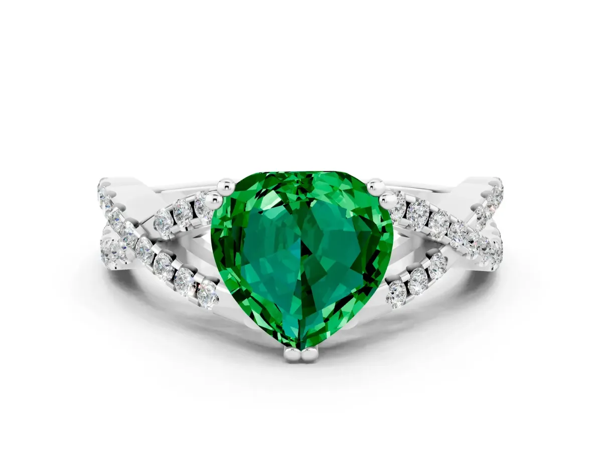 Heart Cut Emerald Solitaire Ring with Four-Prong Setting and Twisted Pavé Band Silver