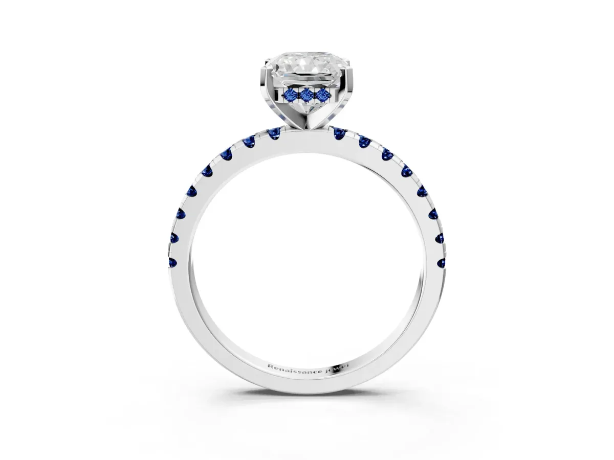 Radiant Cut Diamond Solitaire Ring with Round Blue Sapphire Pavé Band and Four-Prong Setting White gold