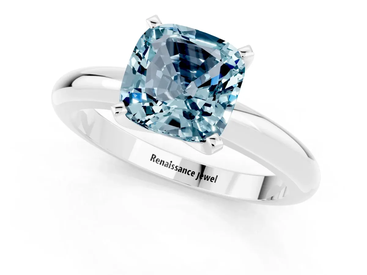 Cushion Cut Aquamarine Solitaire Engagement Ring with Round Band and Four-Prong Setting White gold