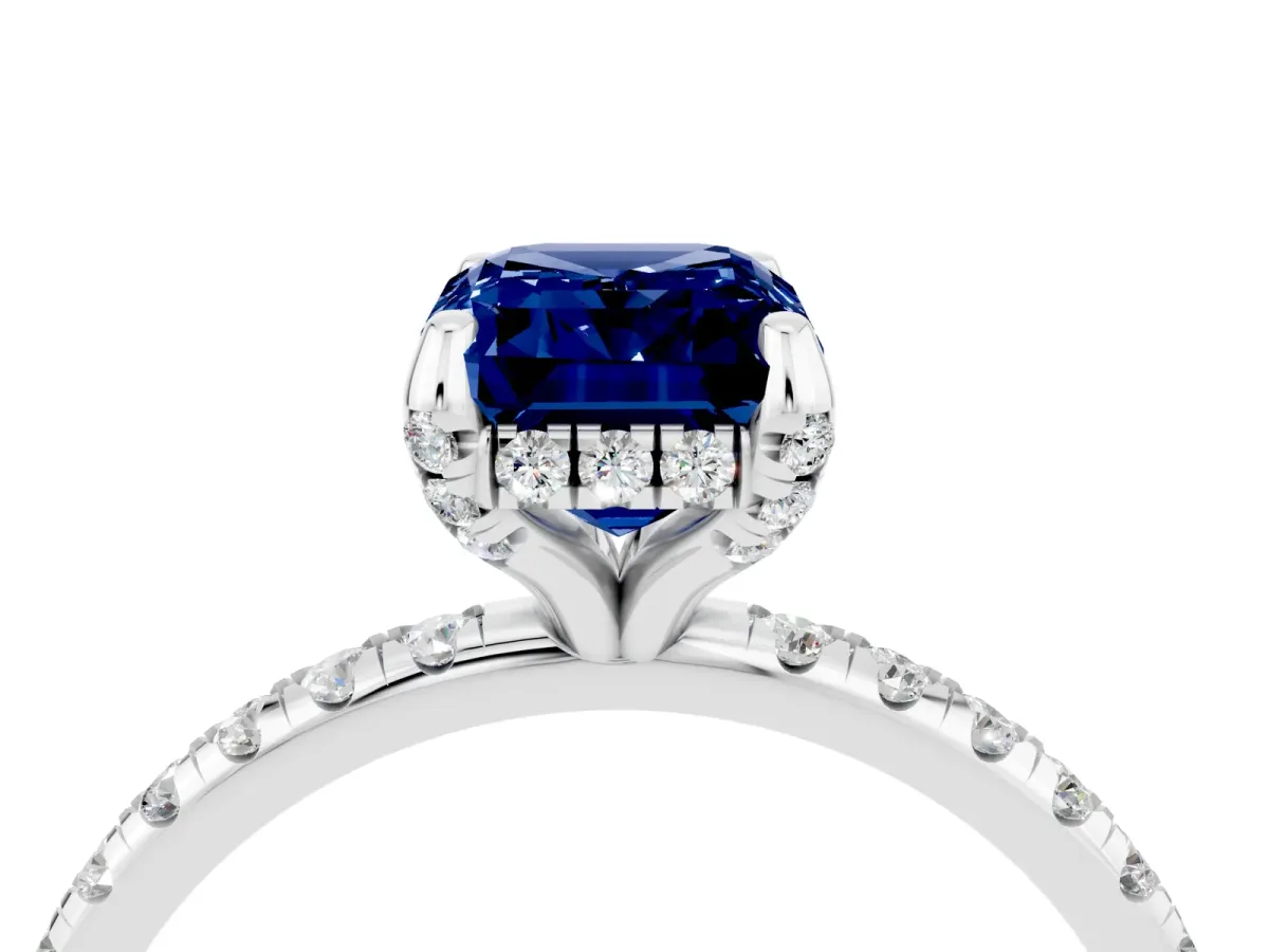 Emerald Cut Blue Sapphire Hidden Halo Engagement Ring with Round Pavé Band and Prong Setting Silver