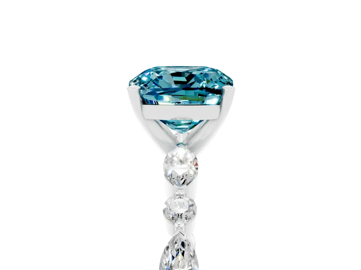 Cushion Cut Blue Topaz Ring with Marquise and Round Side Stones and Four-Prong Setting White gold
