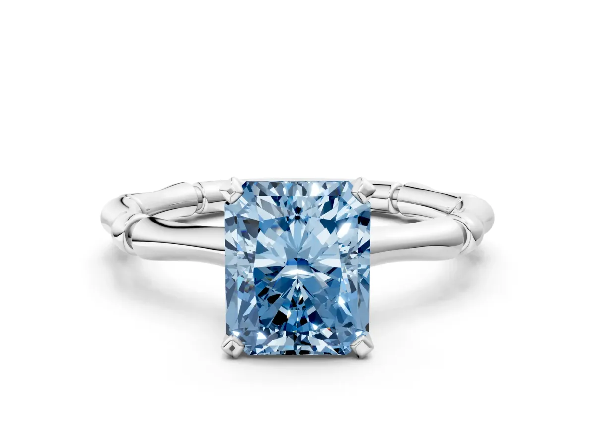 Fancy Blue Radiant Cut Solitaire Diamond Ring with Bamboo Band and Four-Prong Setting Platinum
