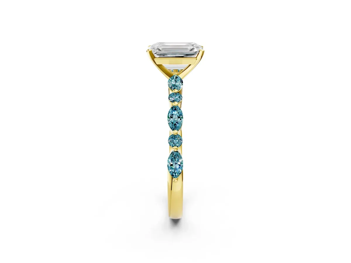 Emerald Cut Diamond Ring with Marquise and Round Blue Topaz Side Stones and Four-Prong Setting Yellow gold