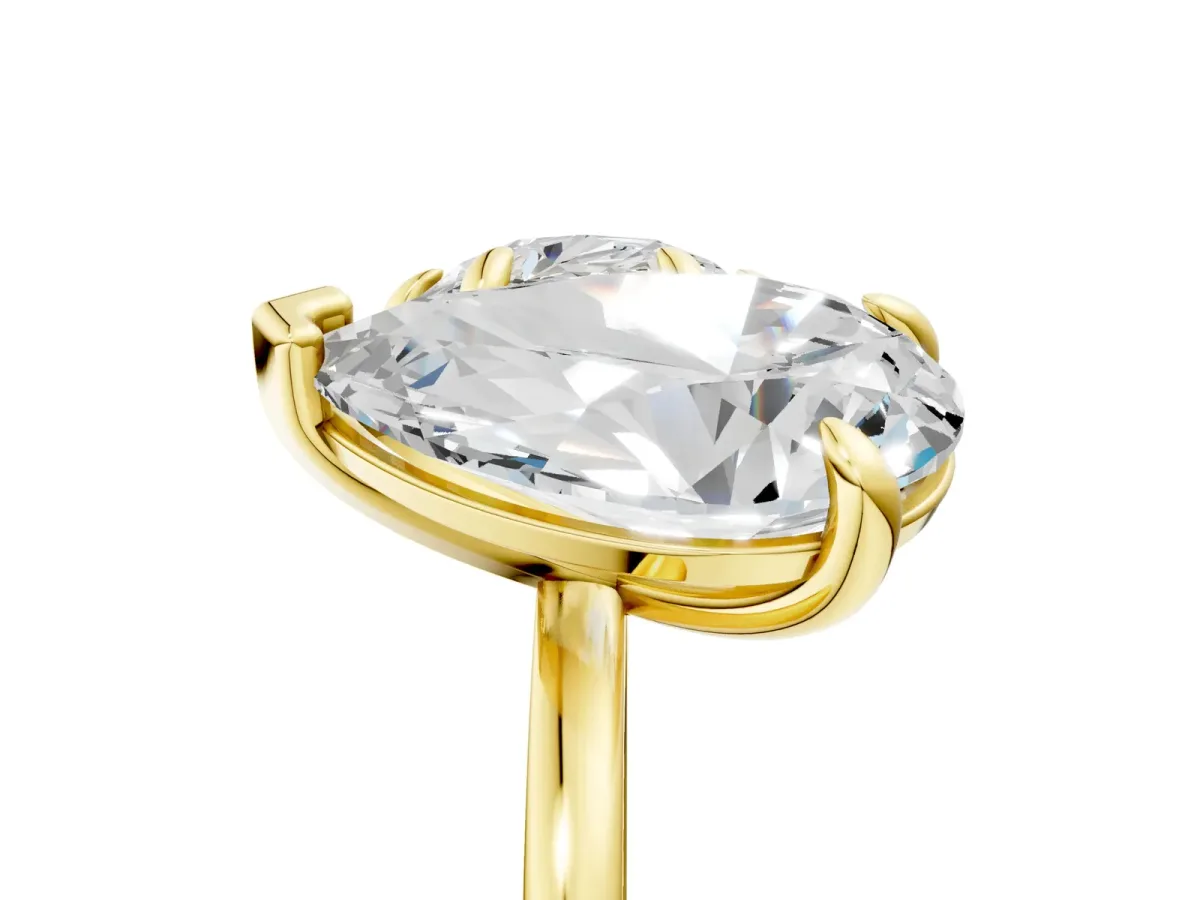 Round Cut and pear toi moi ring Yellow gold