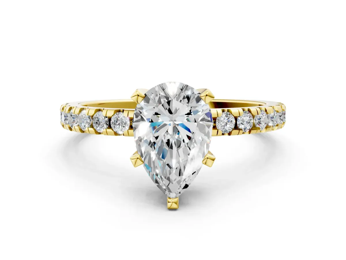 Pear Cut Diamond Solitaire Ring with Round Pavé Band and Four-Prong Setting Yellow gold