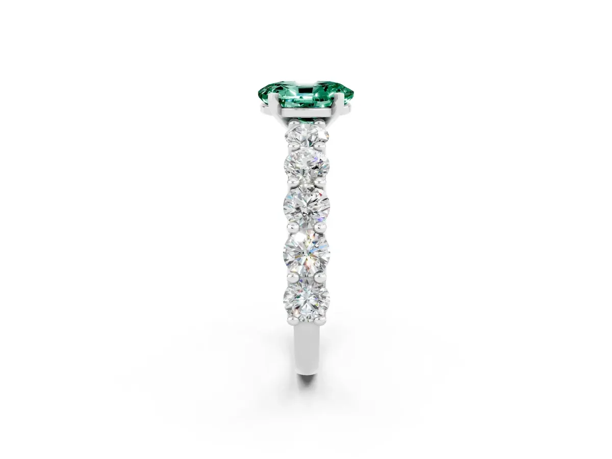 Oval Cut Green Sapphire Prong Setting with Side Stones on a Pave Band Silver