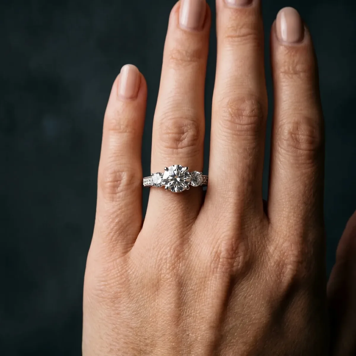 Three-Stone Round Cut Cut Diamond Engagement Ring with Split Shank and Prong Setting Silver