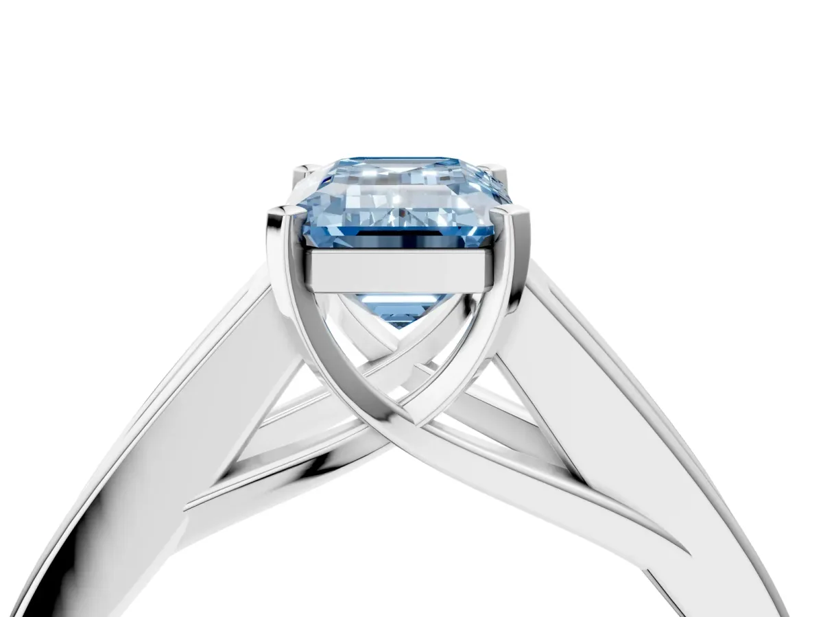 Fancy Blue Emerald Cut Cut Channel Set Solitaire Ring with Four-Prong Setting White gold