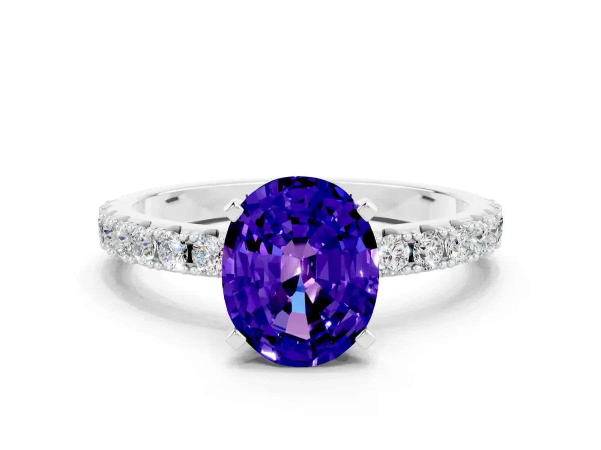 Oval Cut Tanzanite Solitaire Pavé Band with Four-Prong Setting Silver