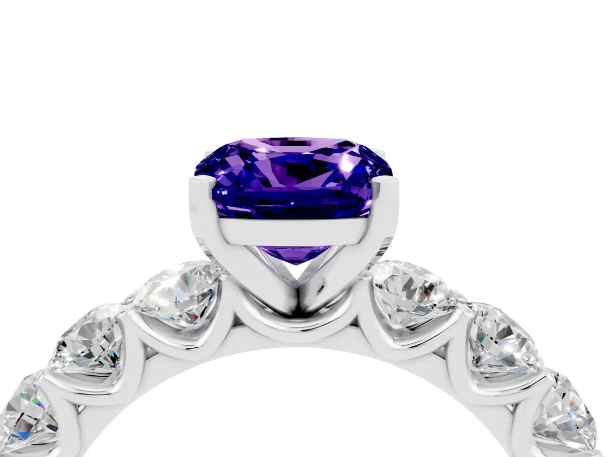 Cushion Cut Tanzanite Prong Setting with Side Stones on a Pave Band Silver