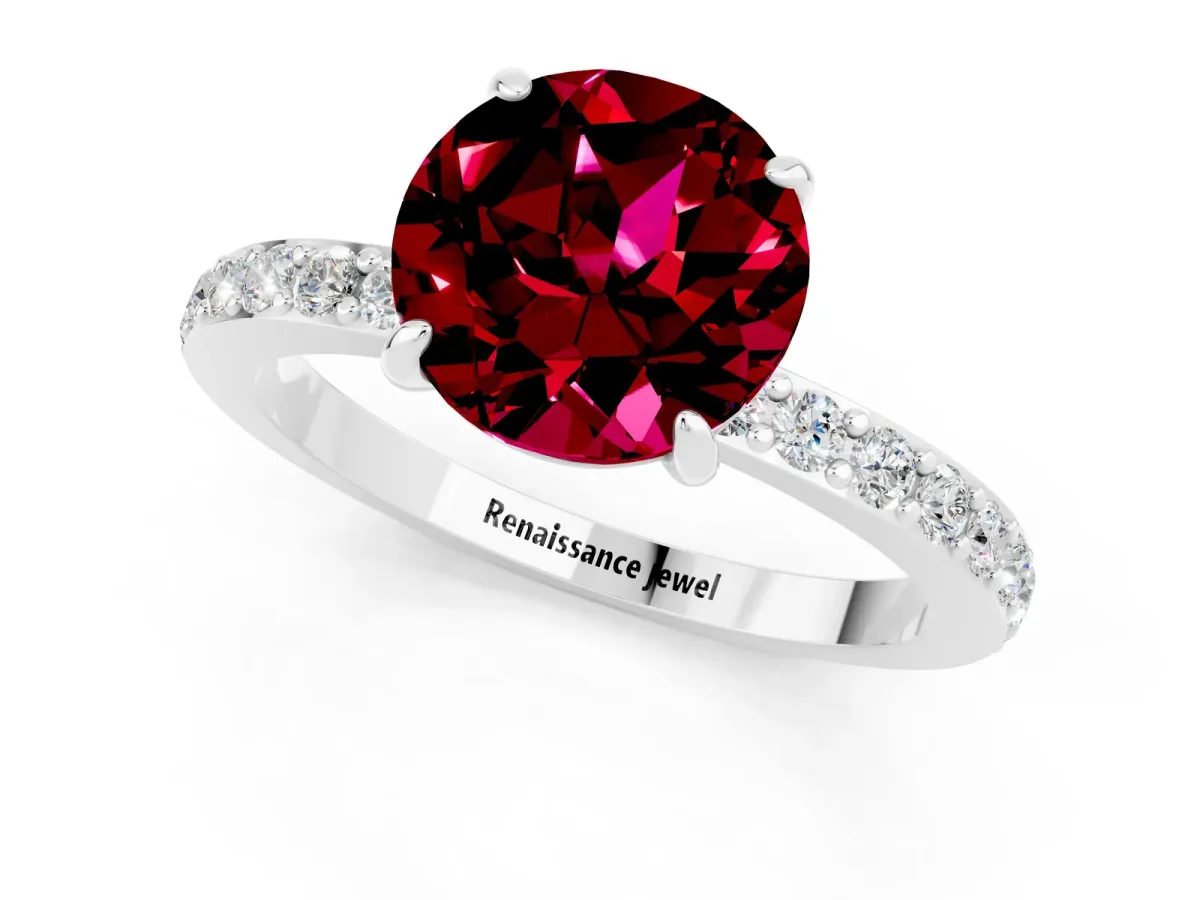 Round Cut Garnet Solitaire Engagement Ring with Pavé Band and Four-Prong Setting Silver