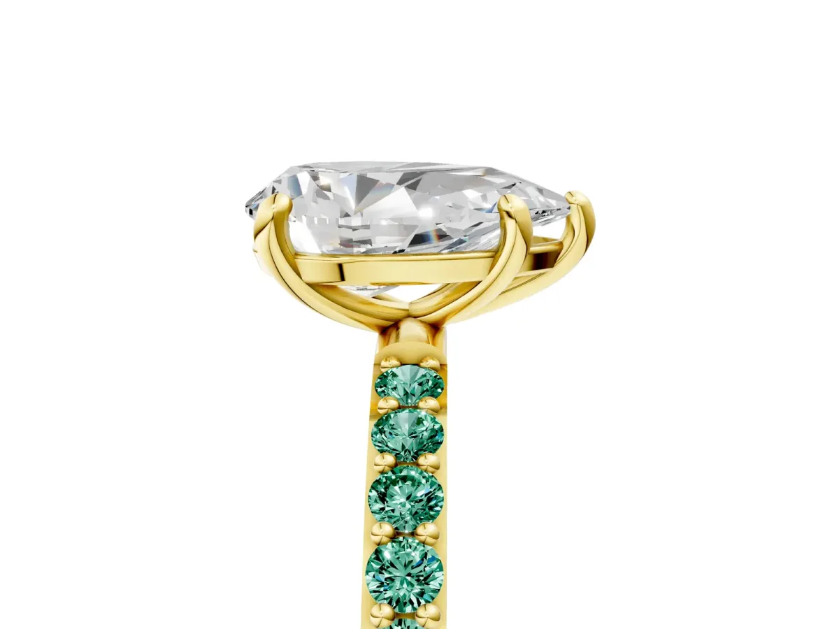 Pear Cut Diamond Solitaire Ring with Round Green Sapphire Pavé Band and Prong Setting Yellow gold