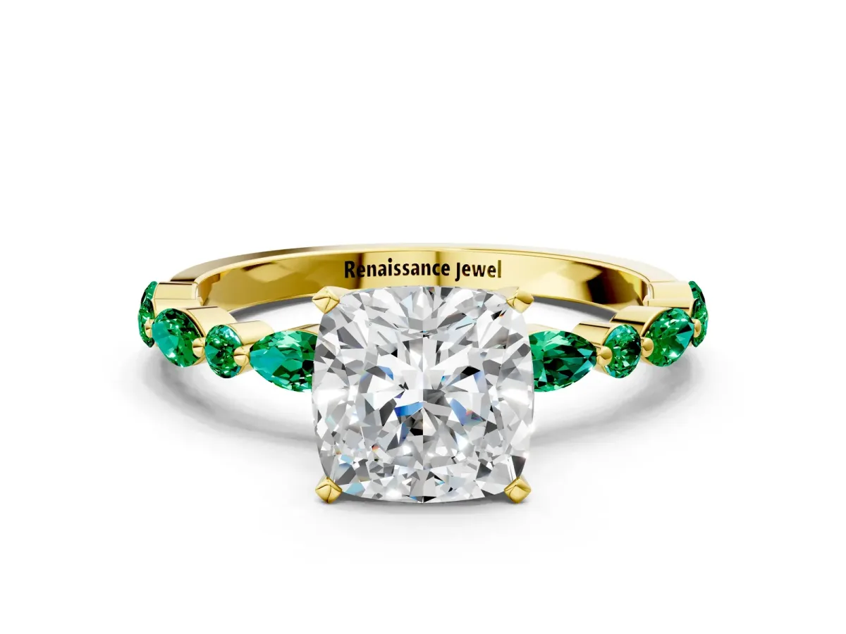 Cushion Cut Diamond Ring with Marquise and Round Emerald Side Stones and Four-Prong Setting Yellow gold