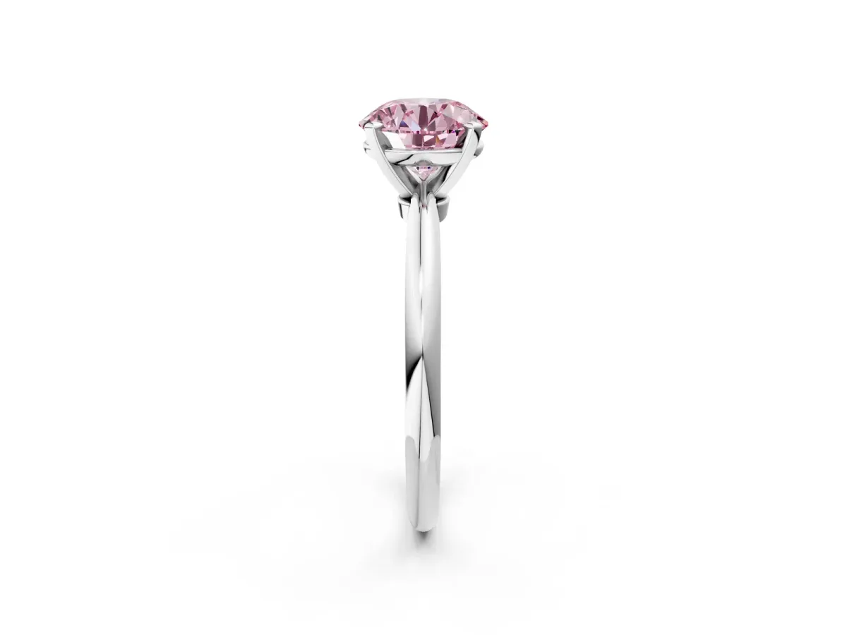 Fancy Pink Round Cut Diamond Solitaire Ring with Six-Prong Setting and Classic Band Silver