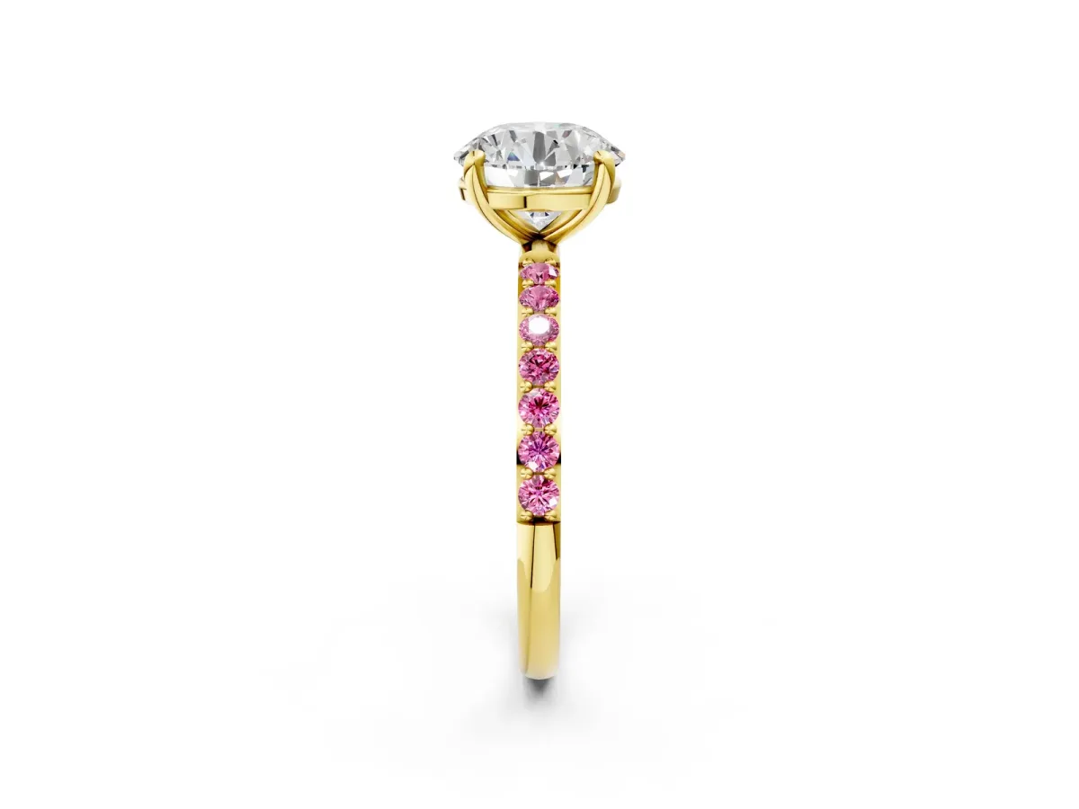 Round Cut Diamond Solitaire Ring with Round Pink Sapphire Pavé Band and Prong Setting Yellow gold