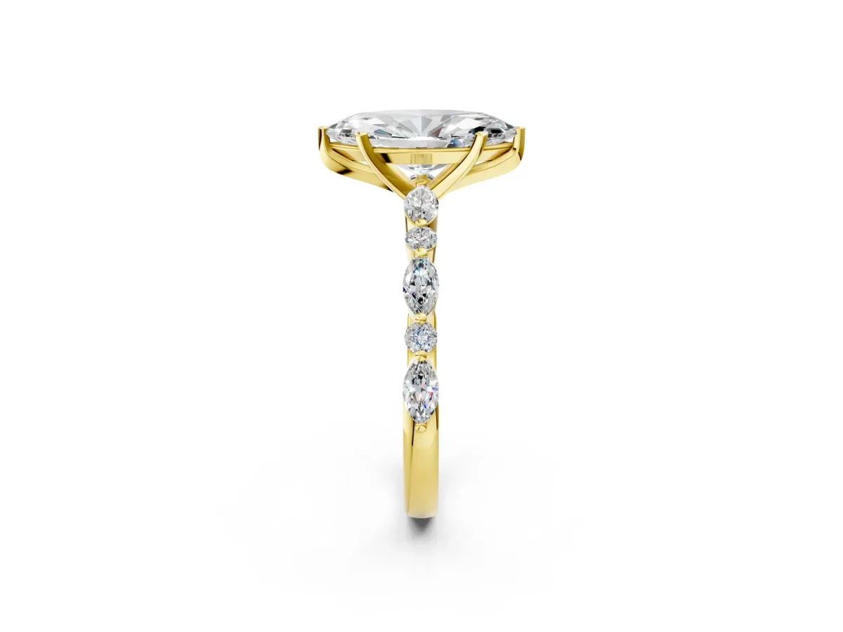 Marquise Cut Diamond Ring with Marquise and Round Side Stones and Four-Prong Setting Yellow gold