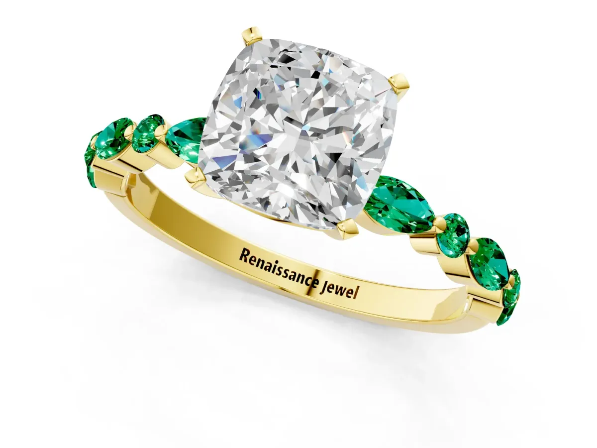 Cushion Cut Diamond Ring with Marquise and Round Emerald Side Stones and Four-Prong Setting Yellow gold