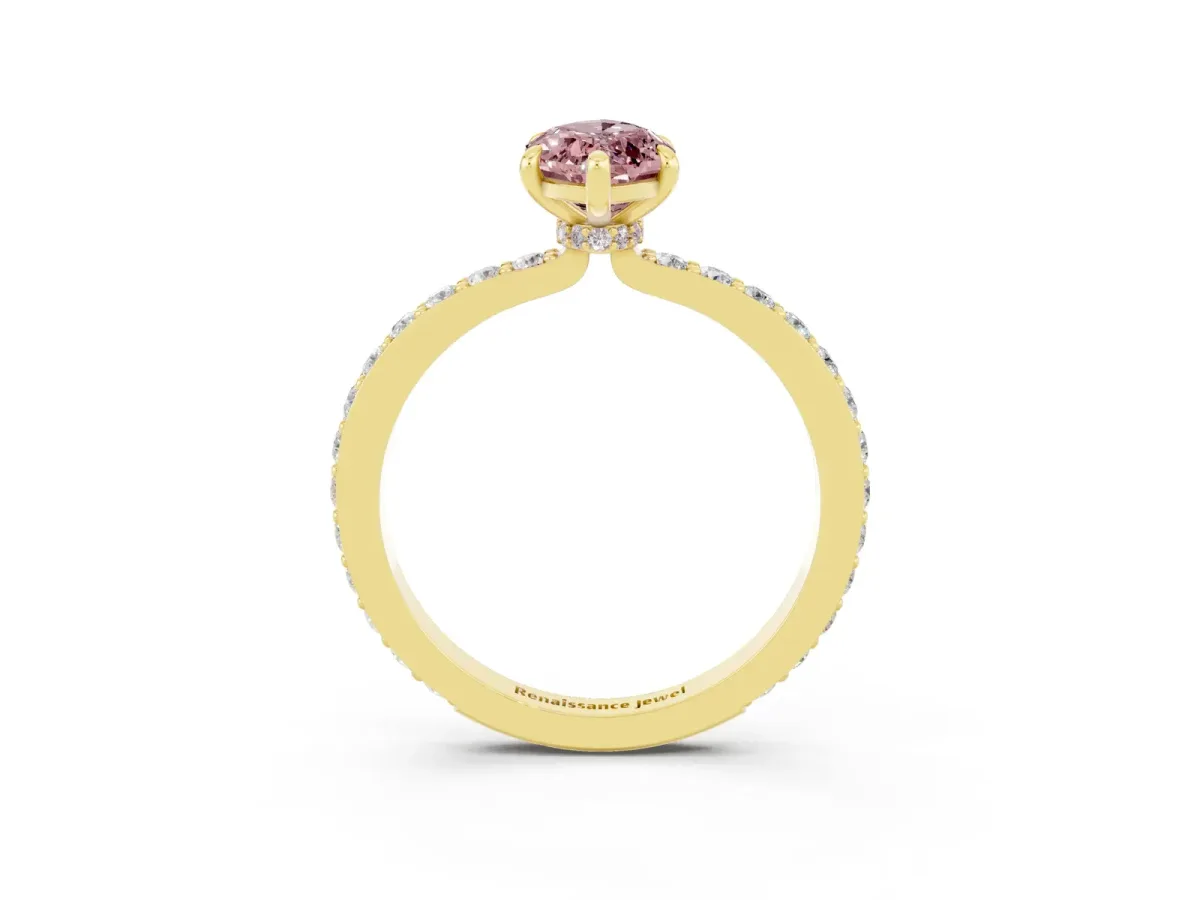 Marquise Cut Morganite Solitaire Engagement Ring with Pavé Band and Four-Prong Setting Yellow gold