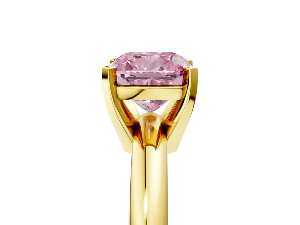 Fancy Pink Cushion Cut Diamond Solitaire Engagement Ring with Round Band and Four-Prong Setting Yellow gold