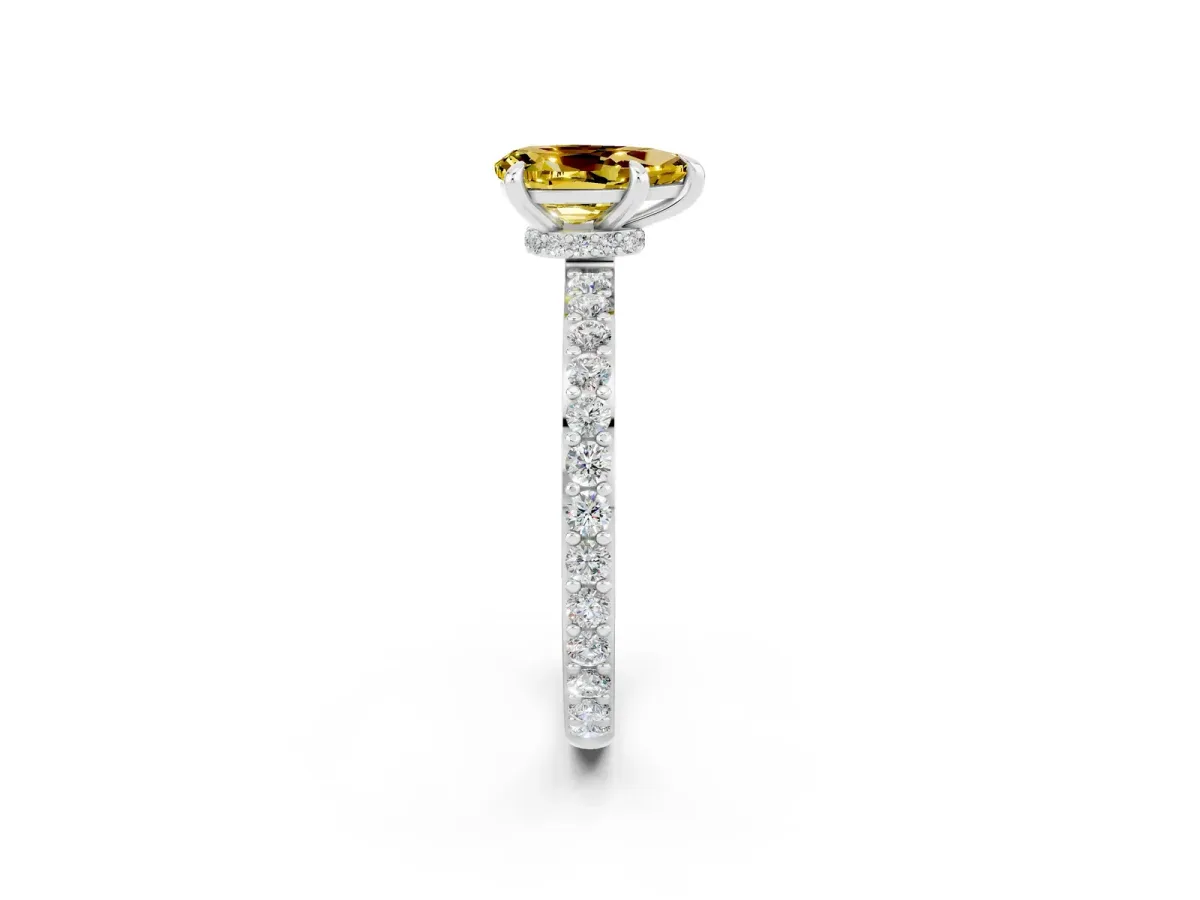 Pear Cut Yellow Sapphire Solitaire Engagement Ring with Pavé Band and Four-Prong Setting White gold