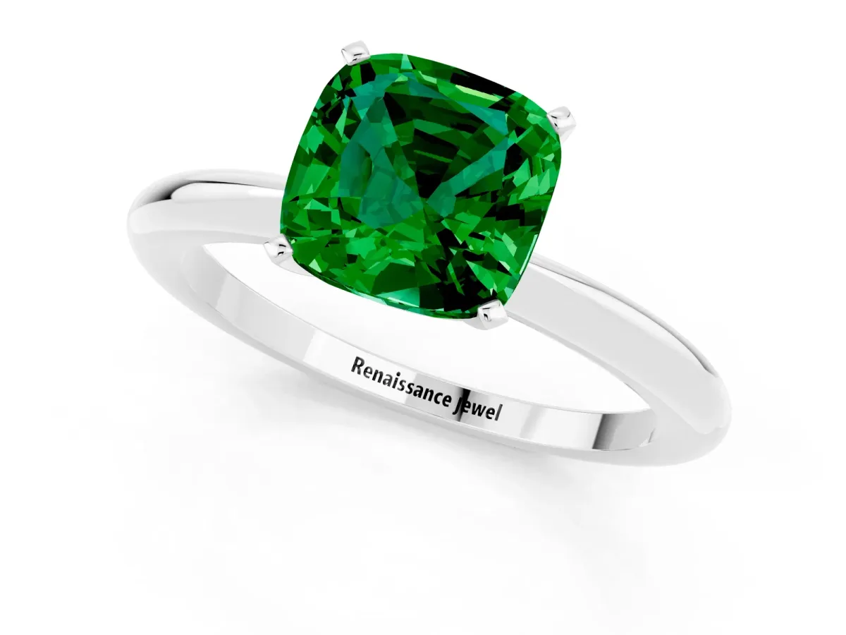 Cushion Cut Emerald Solitaire Ring with Six-Prong Setting and Classic Band Platinum