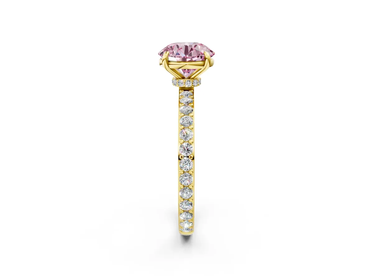 Fancy Pink Round Cut Diamond Solitaire Engagement Ring with Pavé Band and Four-Prong Setting Yellow gold