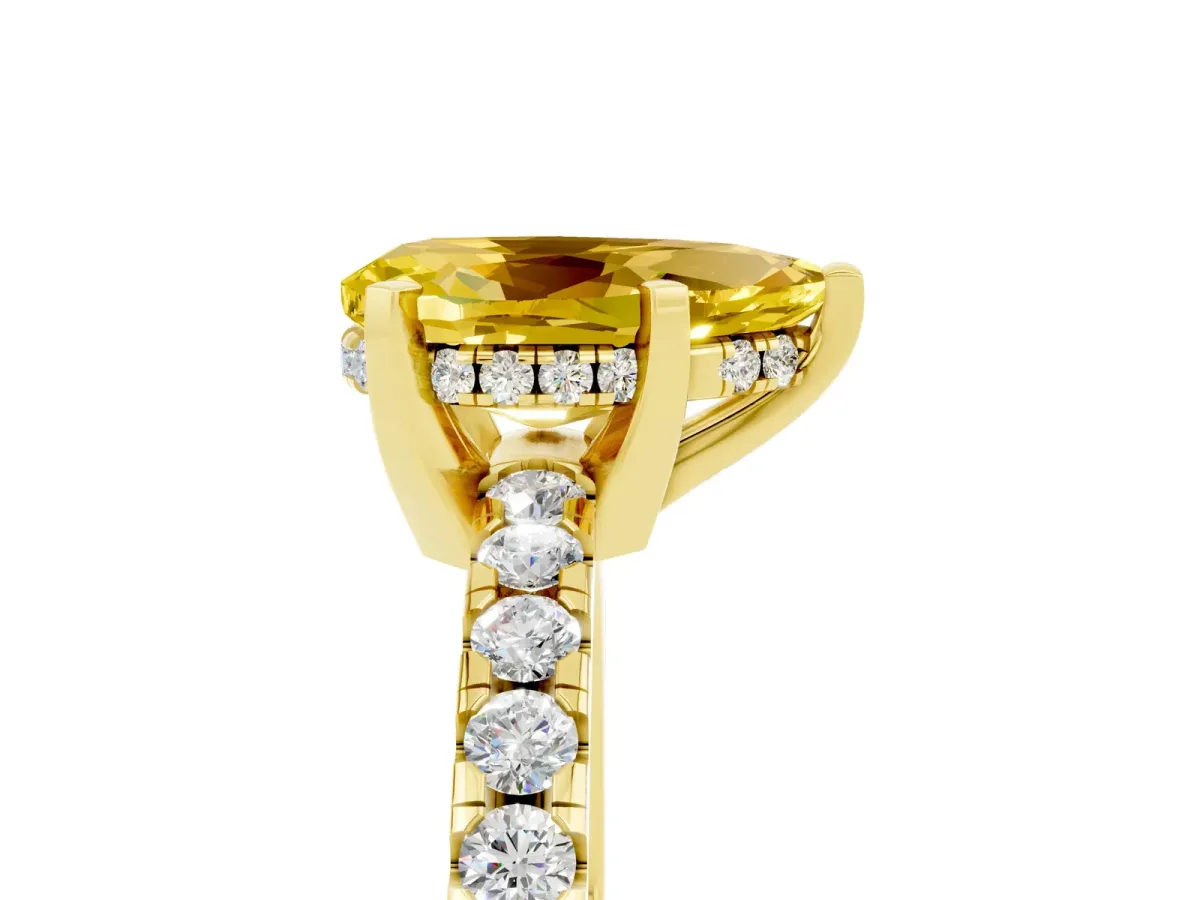 Pear Cut Yellow Sapphire Solitaire Ring with Round Pavé Band and Four-Prong Setting Yellow gold
