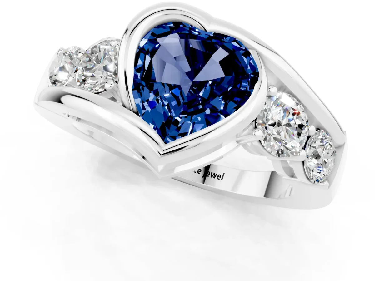 Bezel Set Heart Cut Blue Sapphire Bypass Ring with Round Accents Platinum