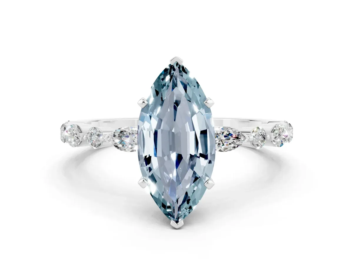 Marquise Cut Aquamarine Ring with Marquise and Round Side Stones and Four-Prong Setting Platinum