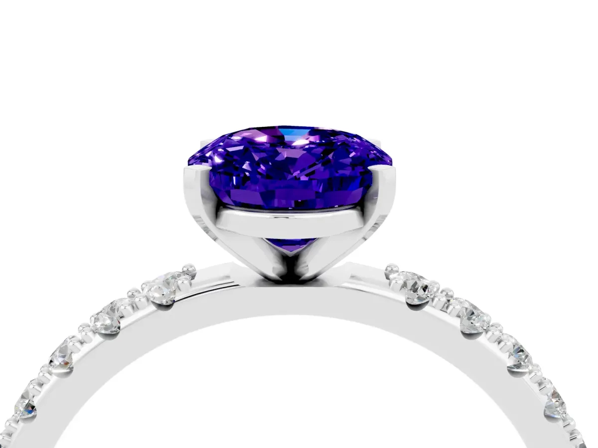 Oval Cut Tanzanite Solitaire Pavé Band with Four-Prong Setting Silver