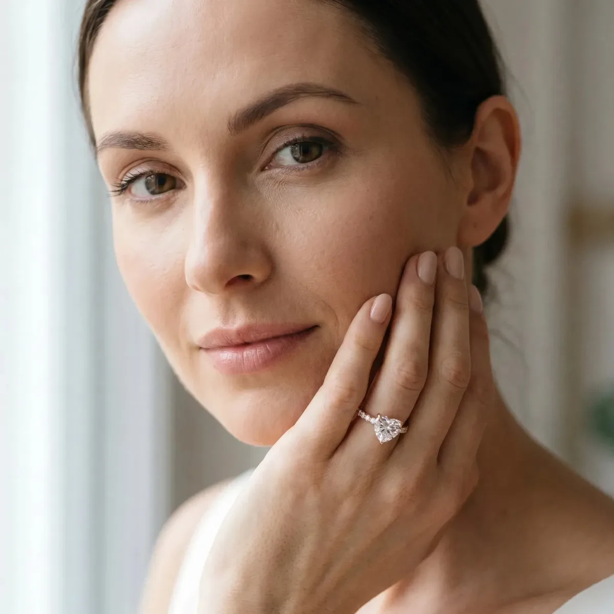 Heart Cut Moissanite Solitaire Ring with Round Pavé Band and Four-Prong Setting Rose gold