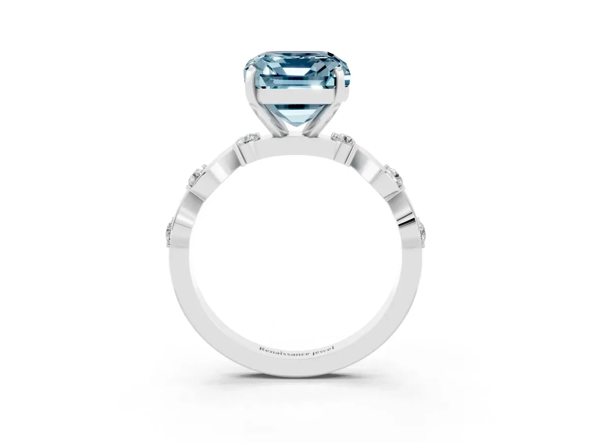 Emerald Cut Aquamarine Solitaire Twisted Band with Round Accents and Prong Setting White gold
