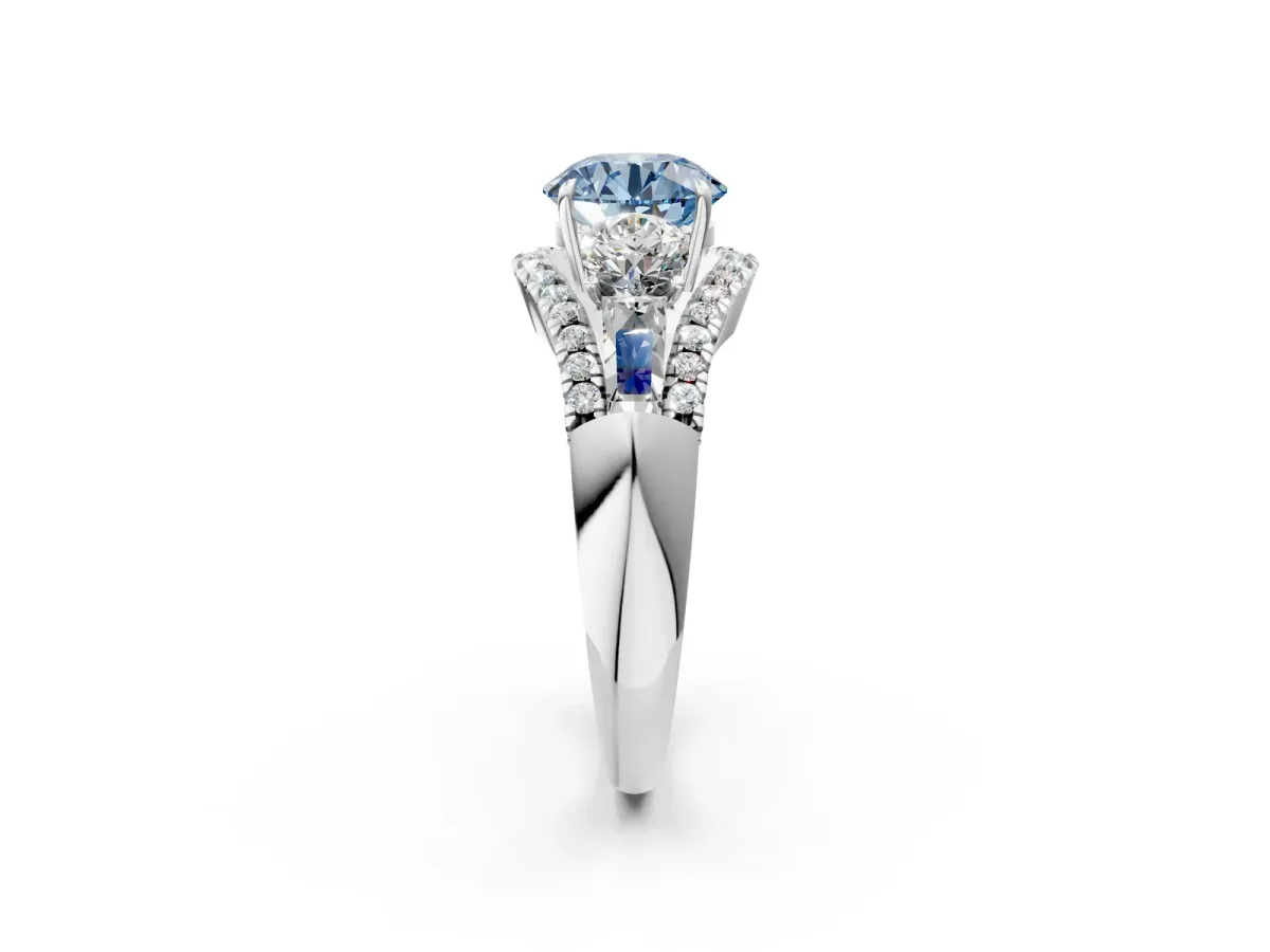 Fancy Blue Three-Stone Round Cut Diamond Engagement Ring with Pave Band and Prong Setting Platinum