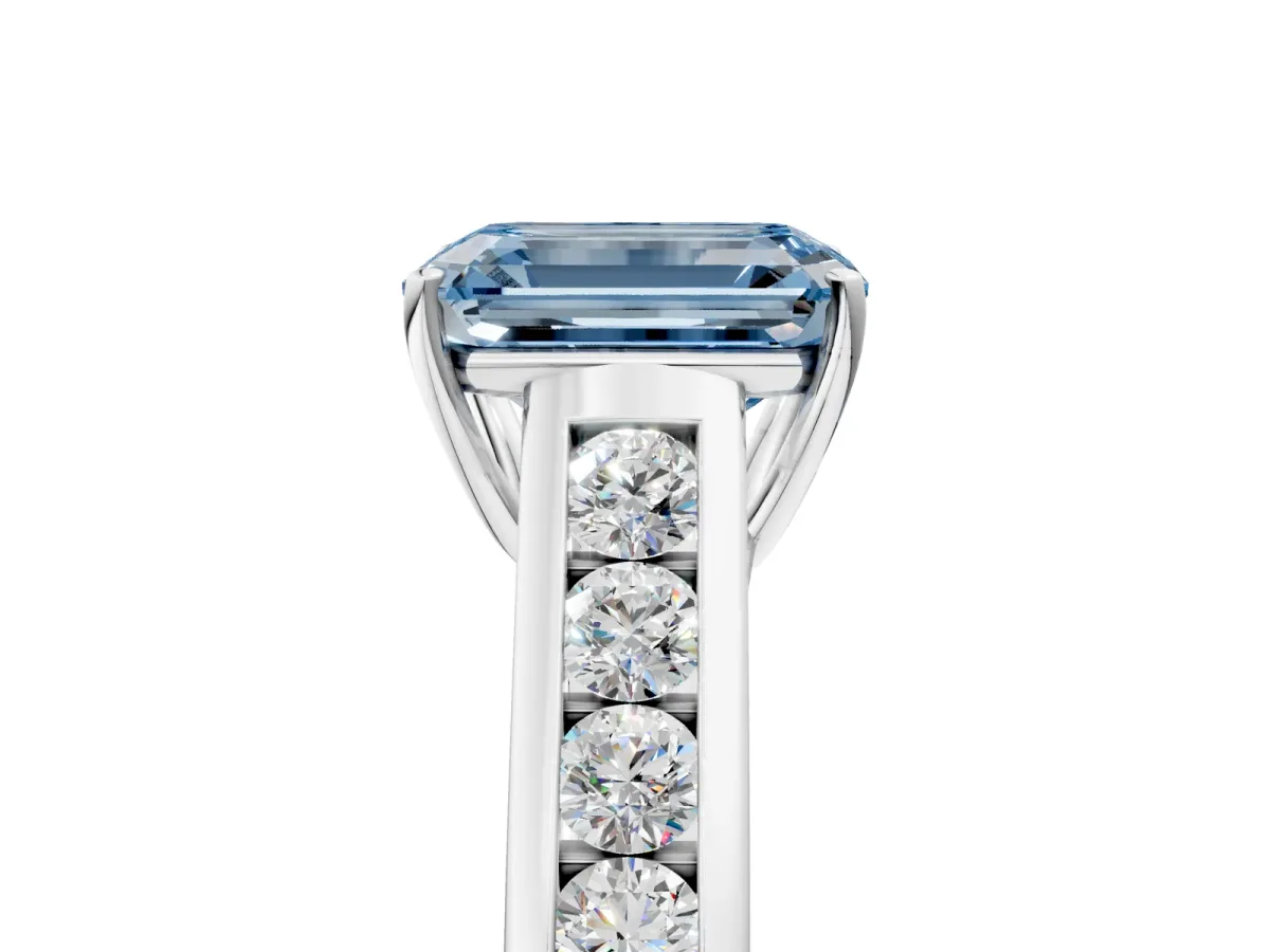 Fancy Blue Emerald Cut Brilliant Channel-Set Solitaire Ring with Four-Prong Setting White gold