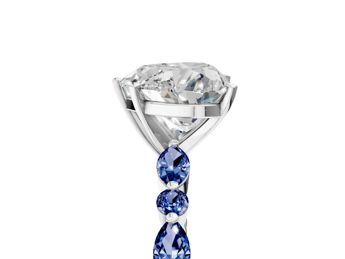 Heart Cut Diamond Ring with Marquise and Round Blue Sapphire Side Stones and Four-Prong Setting White gold