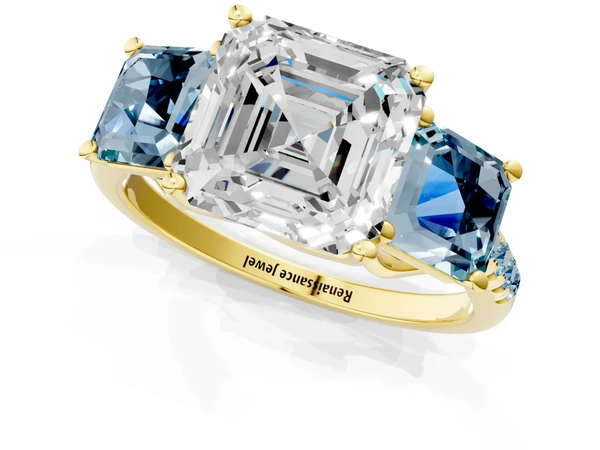 Three-Stone Asscher Cut Diamond Ring with Round Aquamarine Pavé Band and Prong Setting Yellow gold