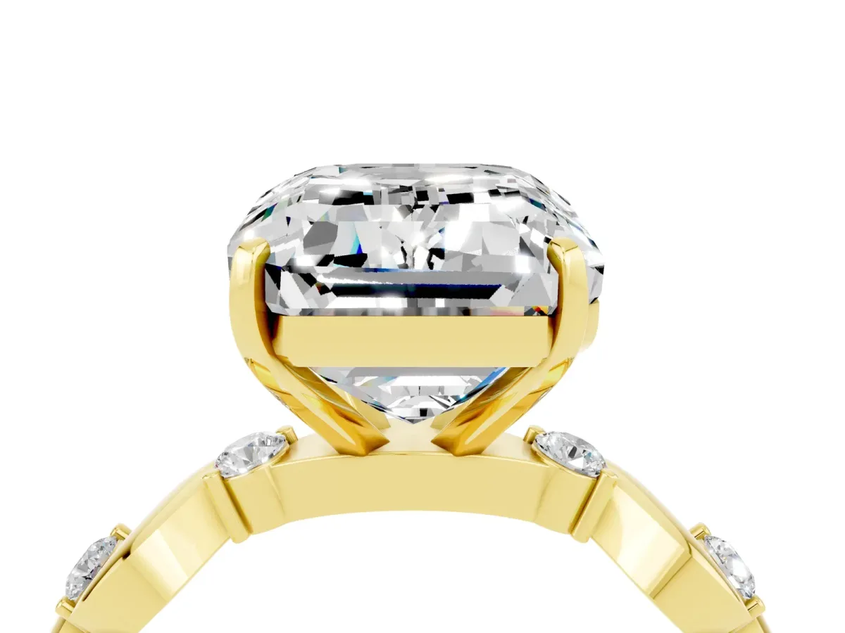 Emerald Cut Moissanite Solitaire Twisted Band with Round Accents and Prong Setting Yellow gold