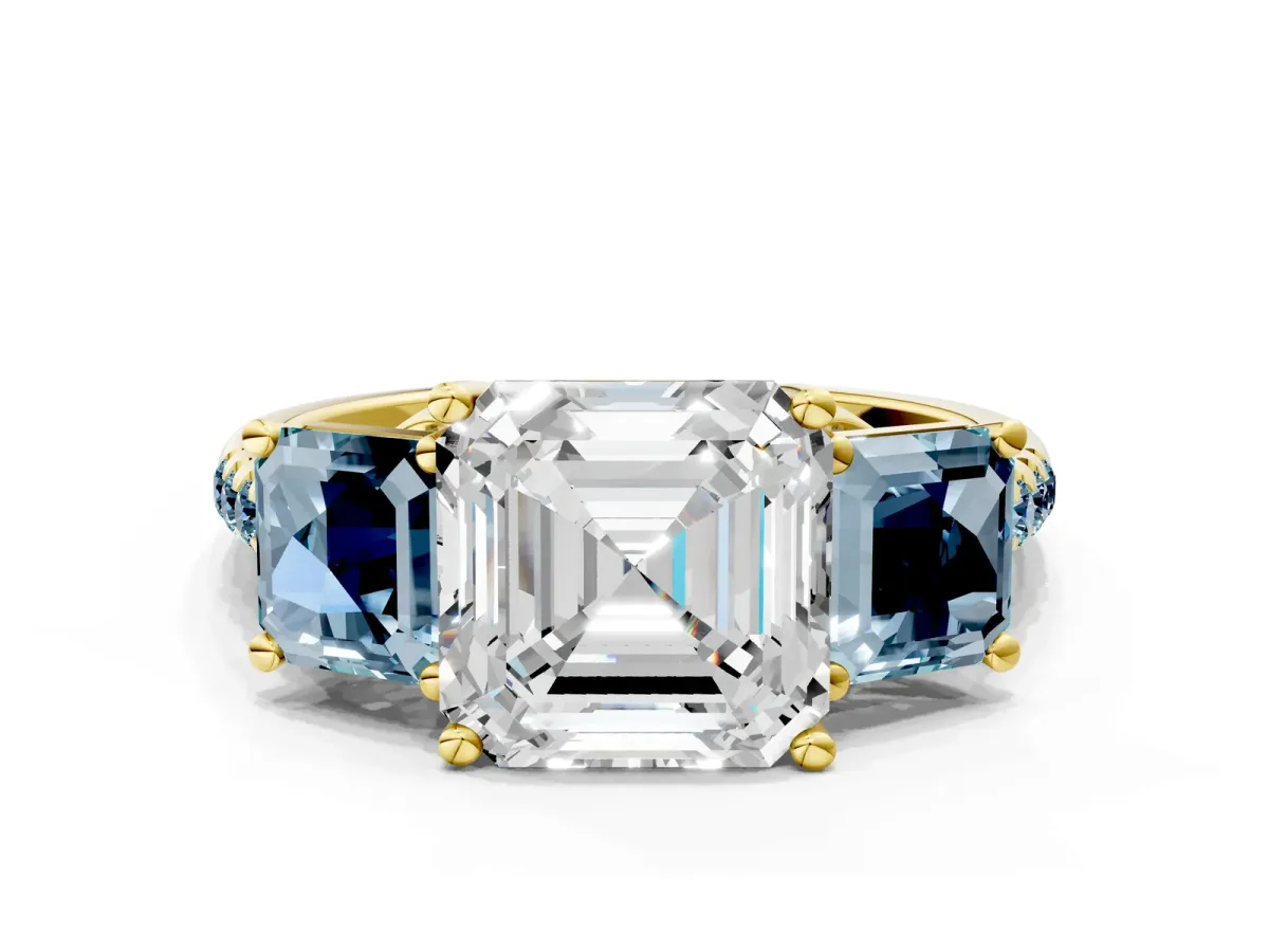 Three-Stone Asscher Cut Diamond Ring with Round Aquamarine Pavé Band and Prong Setting Yellow gold
