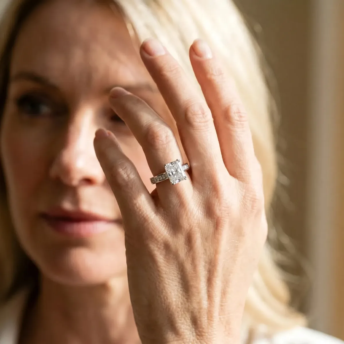 Radiant Cut Cut Channel Set Solitaire Engagement Ring with Prong Setting Platinum
