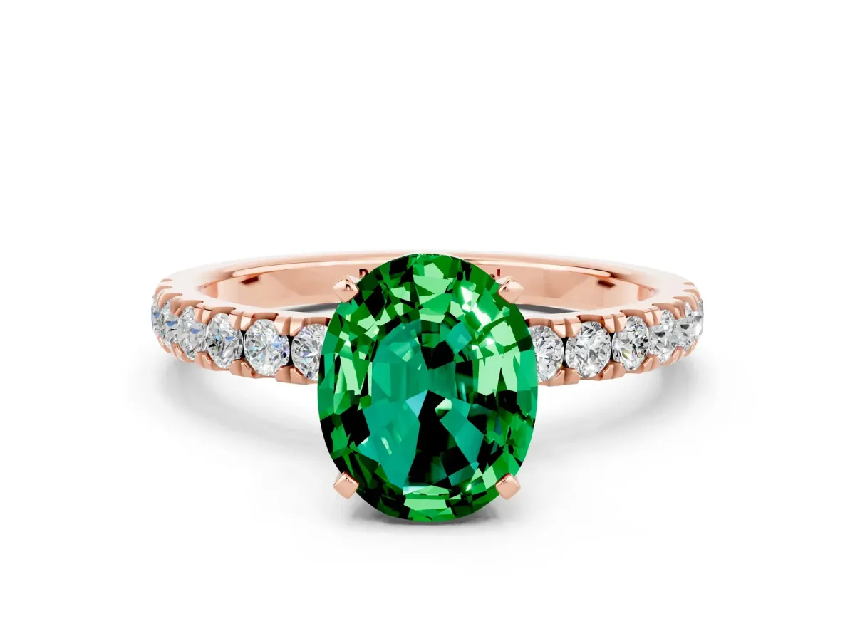 Oval Cut Emerald Solitaire Ring with Pavé Accents and Four-Prong Setting Rose gold