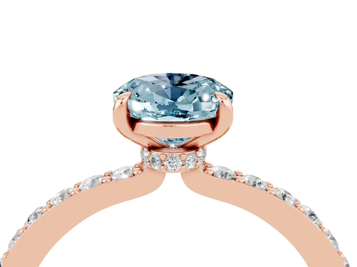 Oval Cut Aquamarine Solitaire Engagement Ring with Pavé Band and Four-Prong Setting Rose gold