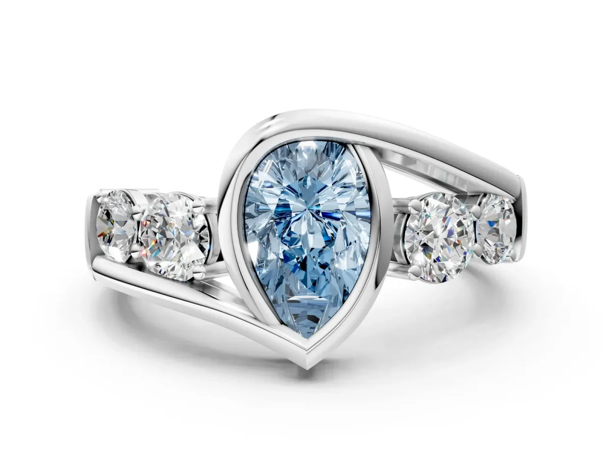 Fancy Blue Bezel Set Pear Cut Diamond Bypass Ring with Round Accents Platinum