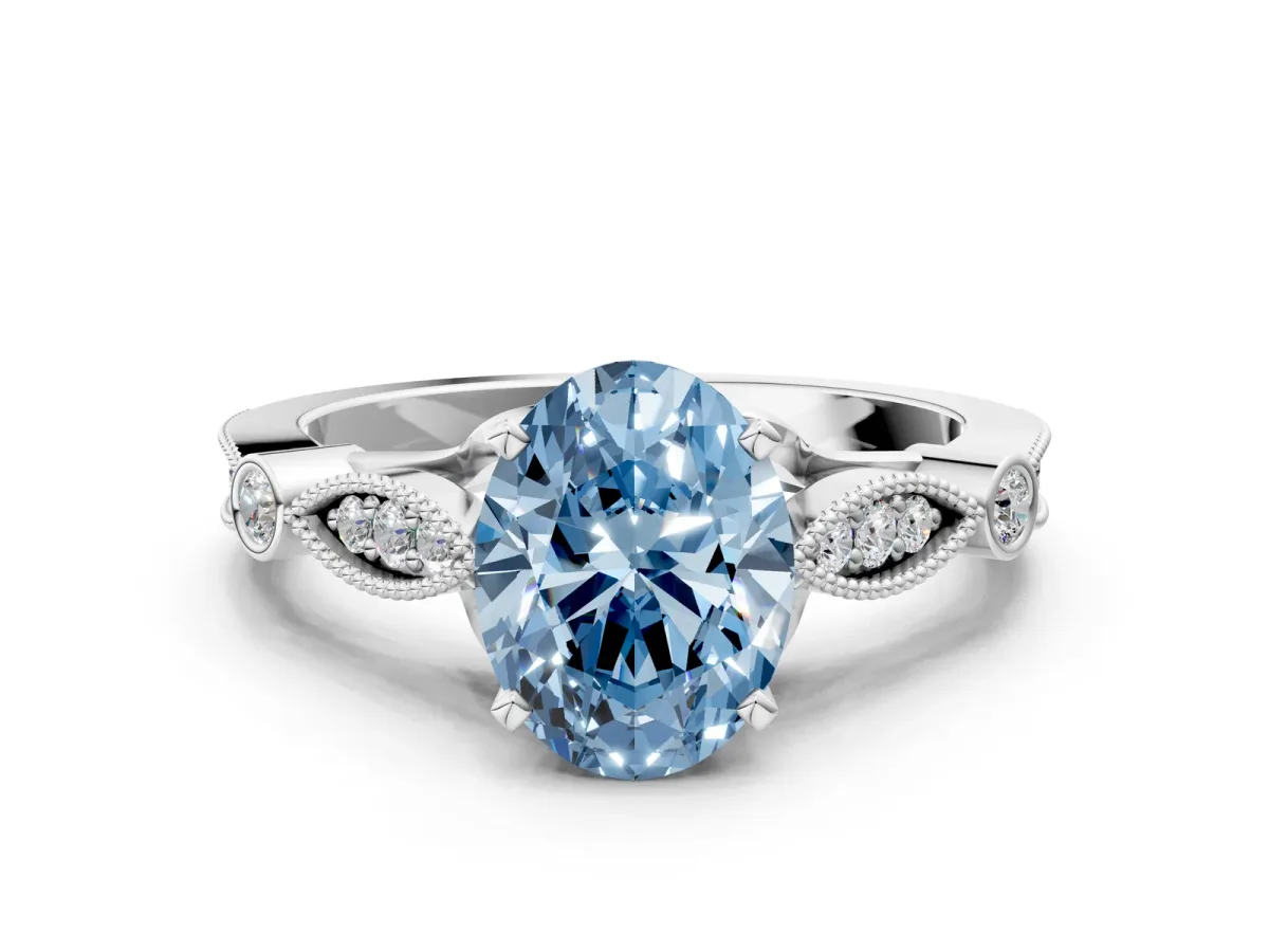 Fancy Blue Oval Cut Cut Diamond with Milgrain Marquise and Bezel Accents on a Solitaire Band with Prong Setting Silver