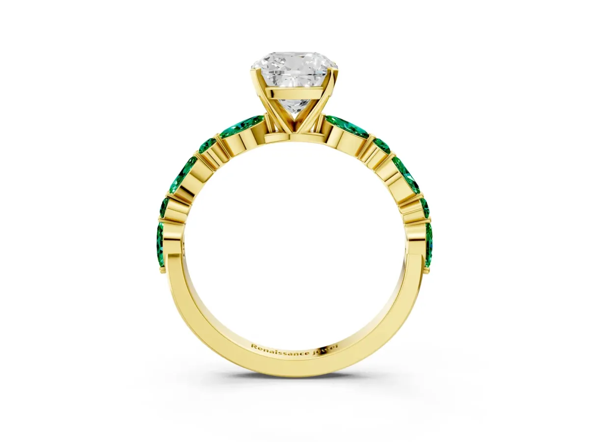 Cushion Cut Diamond Ring with Marquise and Round Emerald Side Stones and Four-Prong Setting Yellow gold