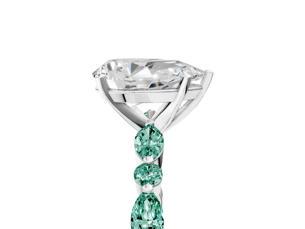 Pear Cut Diamond Ring with Marquise and Round Green Sapphire Side Stones and Four-Prong Setting White gold