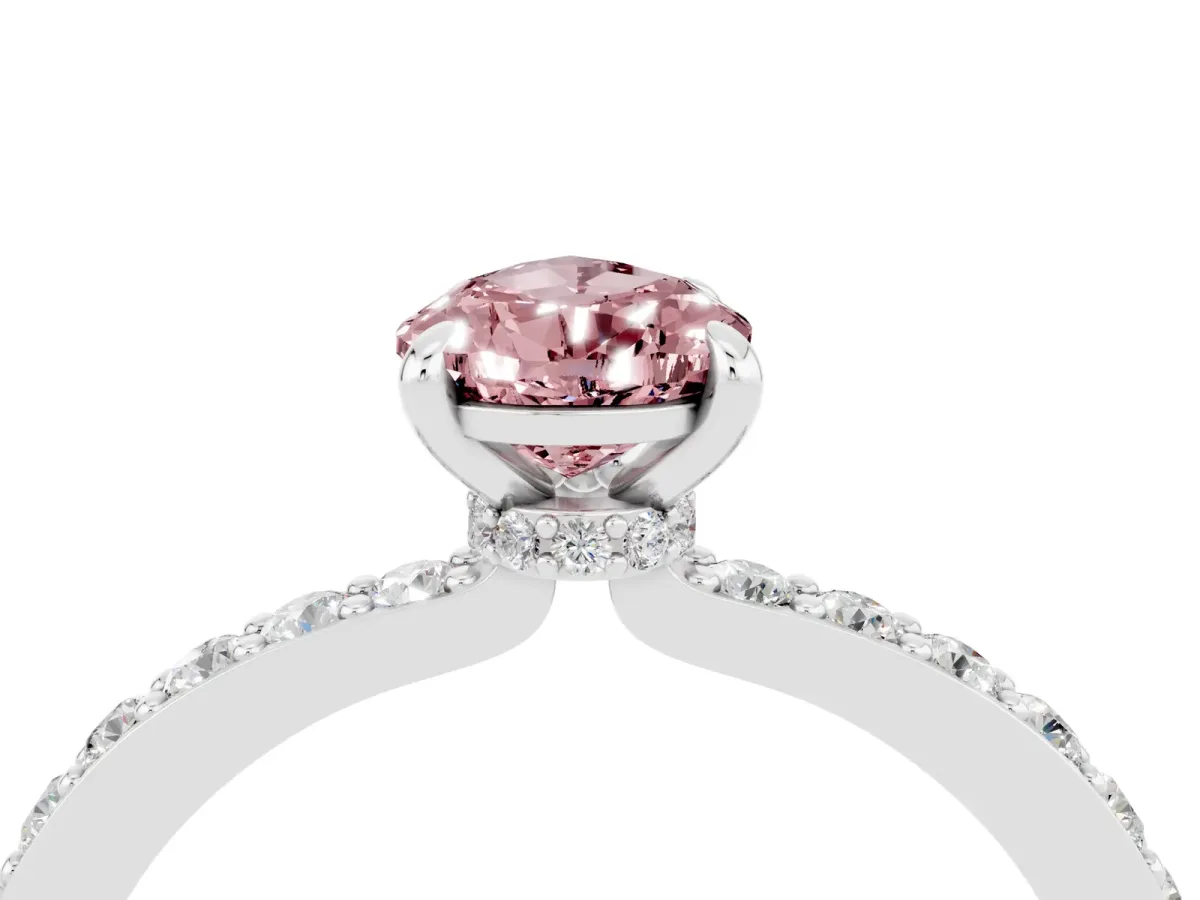 Pear Cut Morganite Solitaire Engagement Ring with Pavé Band and Four-Prong Setting Silver